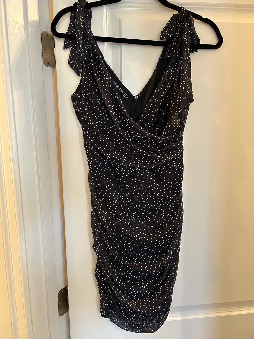 PrettyLittleThing Black Polka Dot Mini Dress with Tie Shoulders